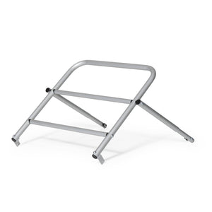 Burley Nomad Cargo Rack on its own, silver tubular frame with cross bars and angled support legs