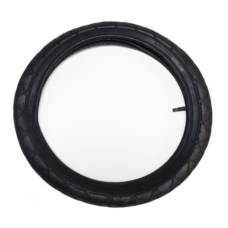 Burley 16 inch black trailer tyre with the inner tube fitted inside and its valve stem showing