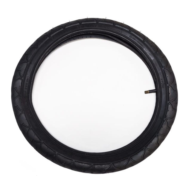 Burley 16 inch black trailer tyre with the inner tube fitted inside and its valve stem showing