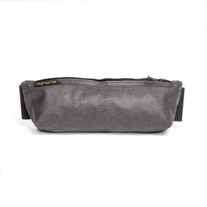 Burley Travoy Rain Cover packed into its grey storage sack with Burley label and mounting straps