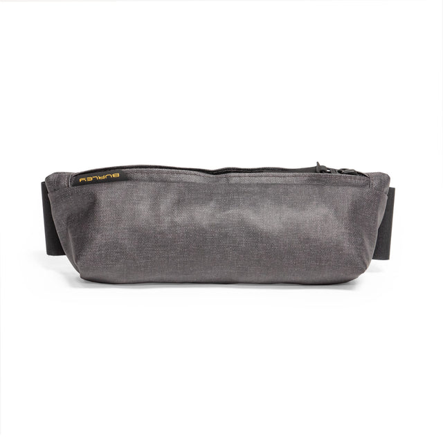 Burley Travoy Rain Cover packed into its grey storage sack with Burley label and mounting straps