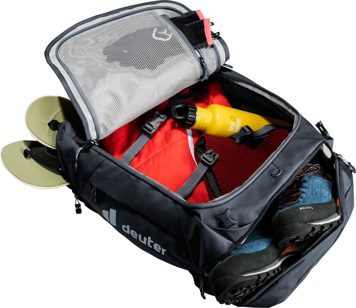 Deuter Duffel Pro 40 opened wide on the arch zip, packed with clothes, shoes and a mesh lid pocket