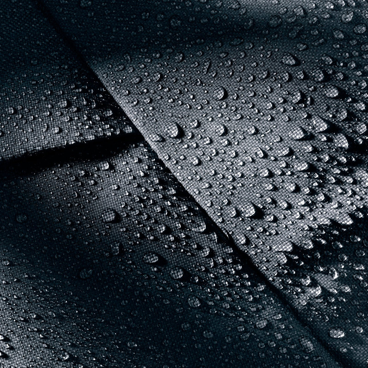 Water beading on the TPU-coated fabric of the Deuter Duffel Pro Movo 36