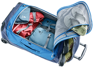 Deuter Duffel Pro Movo 60 laid open and packed, showing inner mesh and zipped compartments