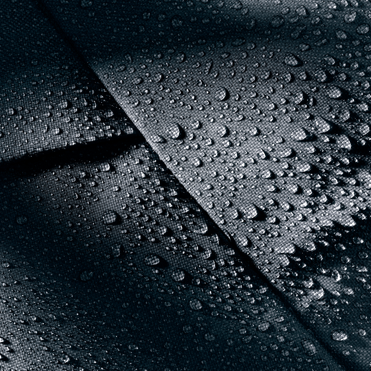 Close-up of water beading on the Deuter Duffel Pro Movo 90 TPU-coated fabric