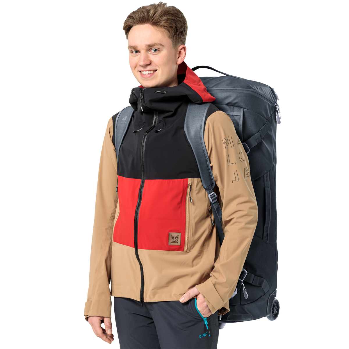 Traveller wearing the Deuter Duffel Pro Movo 90 as a backpack with its shoulder straps