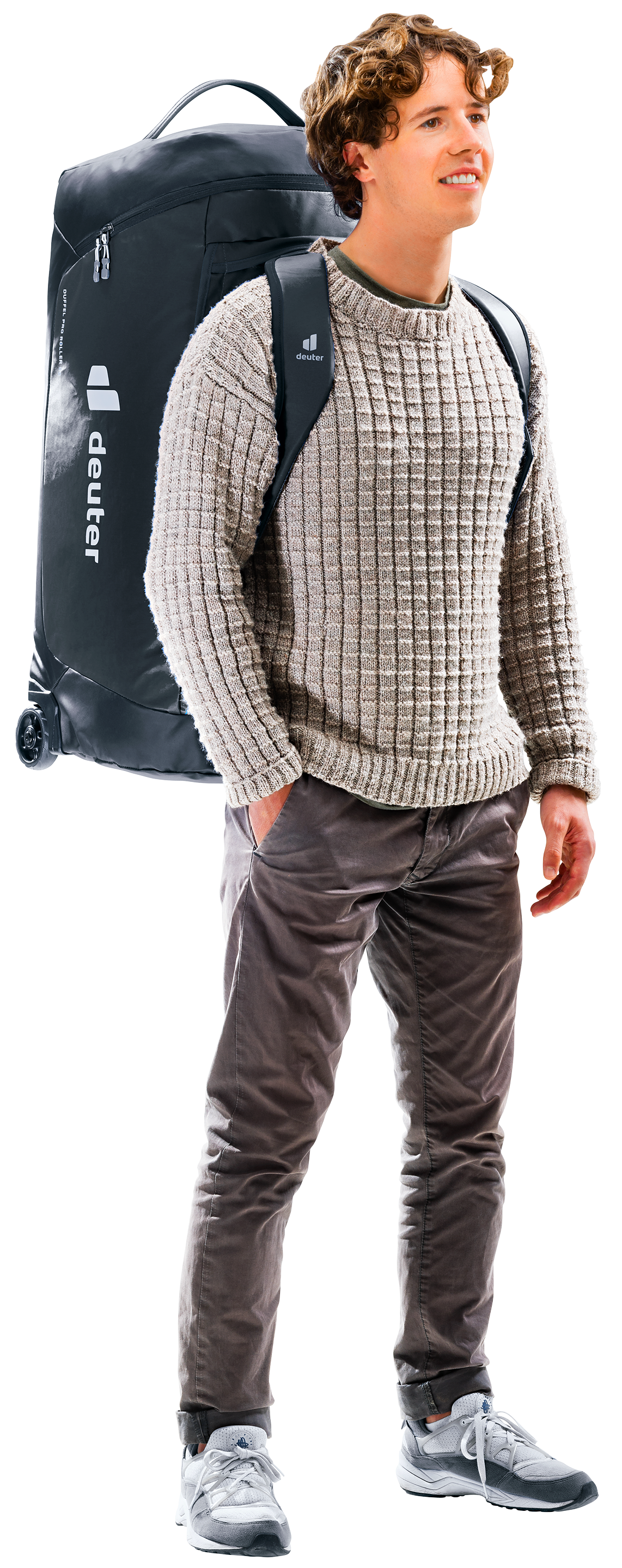 Man carrying the Deuter Duffel Pro Roller 90 as a backpack on its shoulder straps