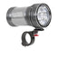 Exposure Six Pack Mk15 bike light in gunmetal on its quick-release handlebar bracket
