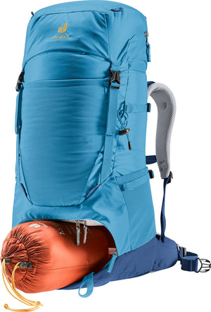 Deuter Fox 40 with a sleeping bag (not included) being packed into the lower section
