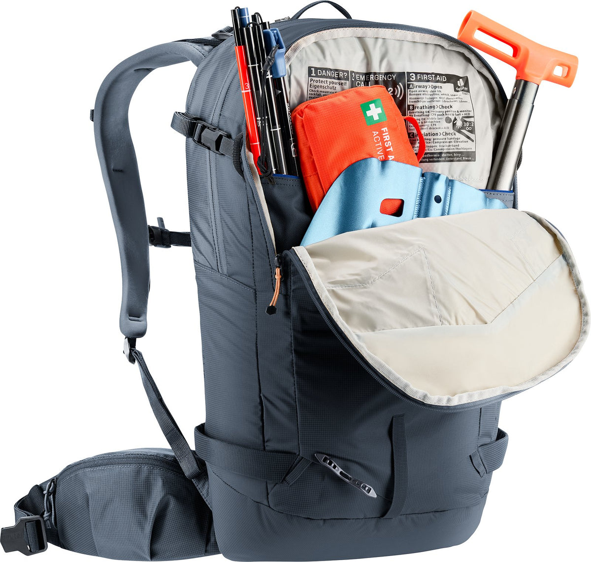 Deuter Freerider 24 avalanche pocket open with shovel blade, probe and first aid kit
