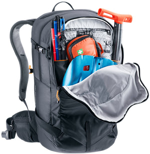 Deuter Freerider 28 SL avalanche pocket open with shovel, probe and first aid kit inside