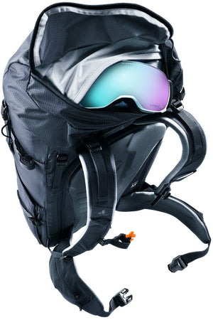 Ski goggles in the fleece-lined goggles pocket at the top of the Deuter Freescape Tour 30 SL