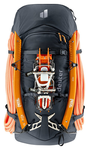 Deuter Freescape Tour 32 carrying an orange rope, crampons and two ice axes on the front