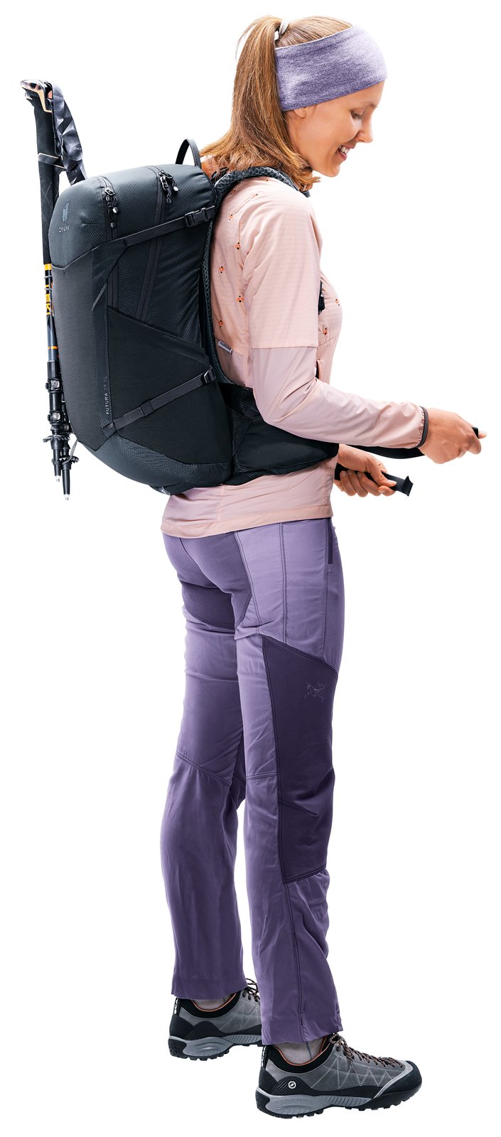 Woman wearing the Deuter Futura 21 SL, side view showing the fit on the back