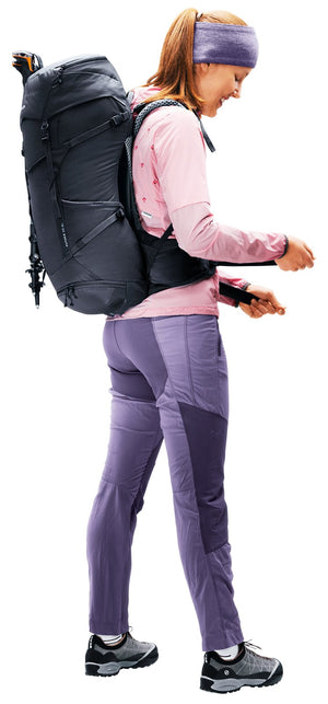 Woman walking with the Deuter Futura 24 SL on her back