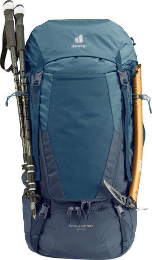 Deuter Futura Air Trek 60+10 with trekking poles and an ice axe attached to the front