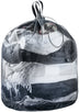 Deuter Mesh Sack 18 in black, drawn closed and filled with folded clothes