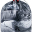Deuter Mesh Sack 5 in Cherry Black, black mesh bag with red base, packed with folded clothes