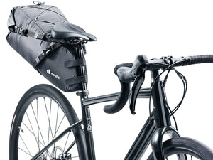 Deuter Mondego SB 16 mounted behind the saddle of a black drop-bar bike