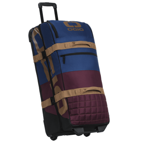 OGIO Trucker Gear Bag in Burgundy/Navy with tan straps, three-quarter view