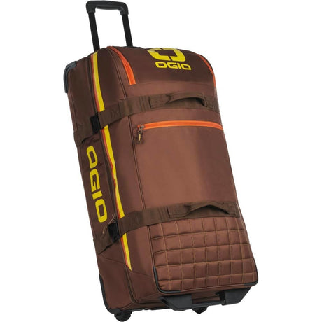 OGIO Trucker Gear Bag in Stay Classy brown with yellow and orange stripe, three-quarter view