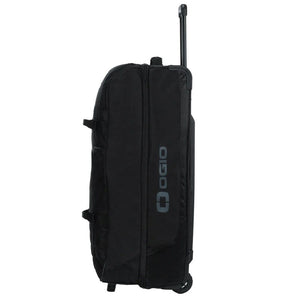 OGIO Trucker Gear Bag in Black, side profile with grey OGIO logo and handle up