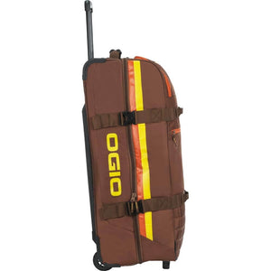 OGIO Trucker in Stay Classy, side profile with telescopic handle extended and wheel