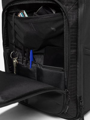 Front organiser pocket of the Orca Casual Backpack holding keys, pens and a notebook