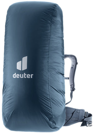 Deuter Raincover III in Ara, deep blue, fitted over a large trekking backpack