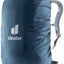 Deuter Raincover Square in Ara blue fitted over a daypack, shoulder straps visible