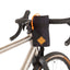 Restrap Stem Bag on a drop-bar bike with the cuff tucked down and orange cord looped over