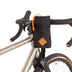 Restrap Stem Bag on a drop-bar bike with the cuff tucked down and orange cord looped over