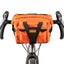 Restrap Bar Pack in orange mounted on drop handlebars, front view