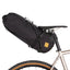 Restrap Saddle Bag 14 L with black cordage mounted on a bike with tan-wall tyres