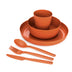 Close view of the Burnt Orange Camp Dinnerware Set stacked, with spoon, fork and knife in front