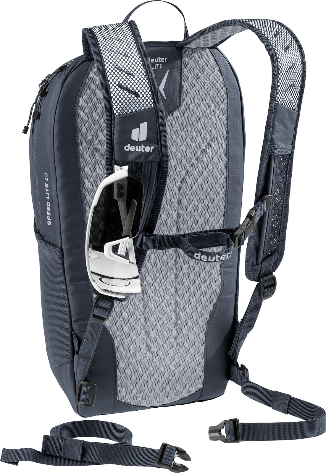 Deuter Speed Lite 13 with sunglasses held on the shoulder strap and the waist belt hanging loose