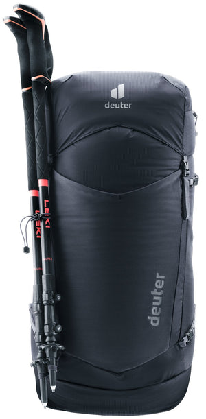Deuter Speed Lite Pro 28 SL carrying trekking poles on the side attachment