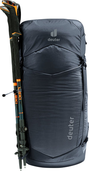 Deuter Speed Lite Pro 30 with trekking poles (not included) on the side attachment