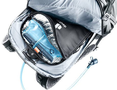 Deuter Streamer Thermo Bag open inside a backpack, showing the foil lining around a hydration bladder