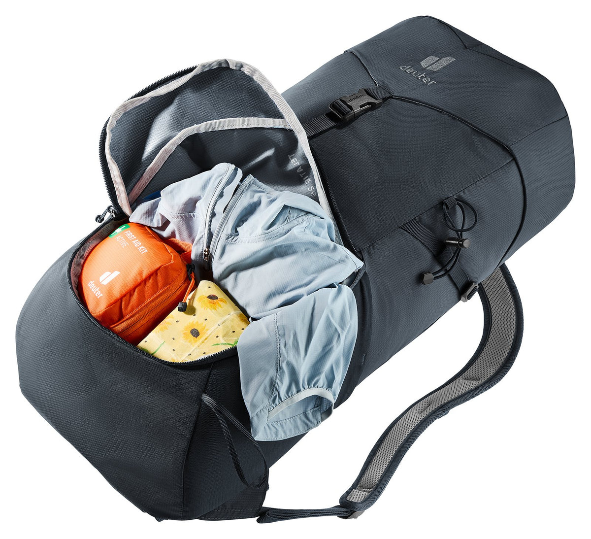 Deuter Telatie 26 J-zip front opening folded back showing food and a jacket inside