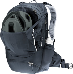 Deuter Trans Alpine 24 carrying a mountain bike helmet in the front stash pocket