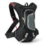 USWE Moto Hydro 8L XTR hydration pack in black and grey, front three-quarter view with red drinking tube