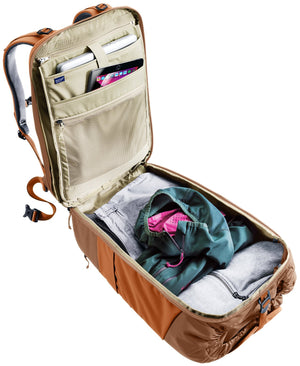 Deuter Utilion 34+5 back panel unzipped, showing the organiser with a laptop sleeve and clothes inside