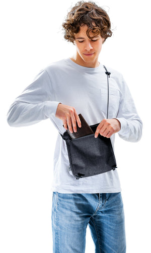 Detached front pocket of the Deuter Walker 24 worn as a crossbody bag