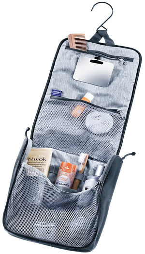 Deuter Wash Center II hanging open on its hook, showing mirror, mesh pockets and toiletries