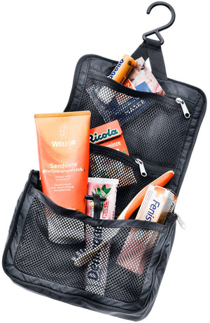 Deuter Wash Center Lite I hanging open on its hook, toiletries in the mesh pockets