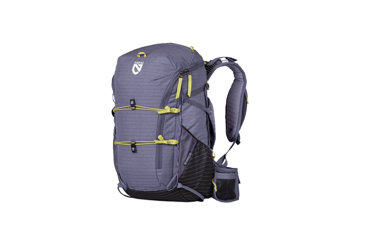 Nemo Persist women's pack in Blue Granite with lime cord lashing on the front